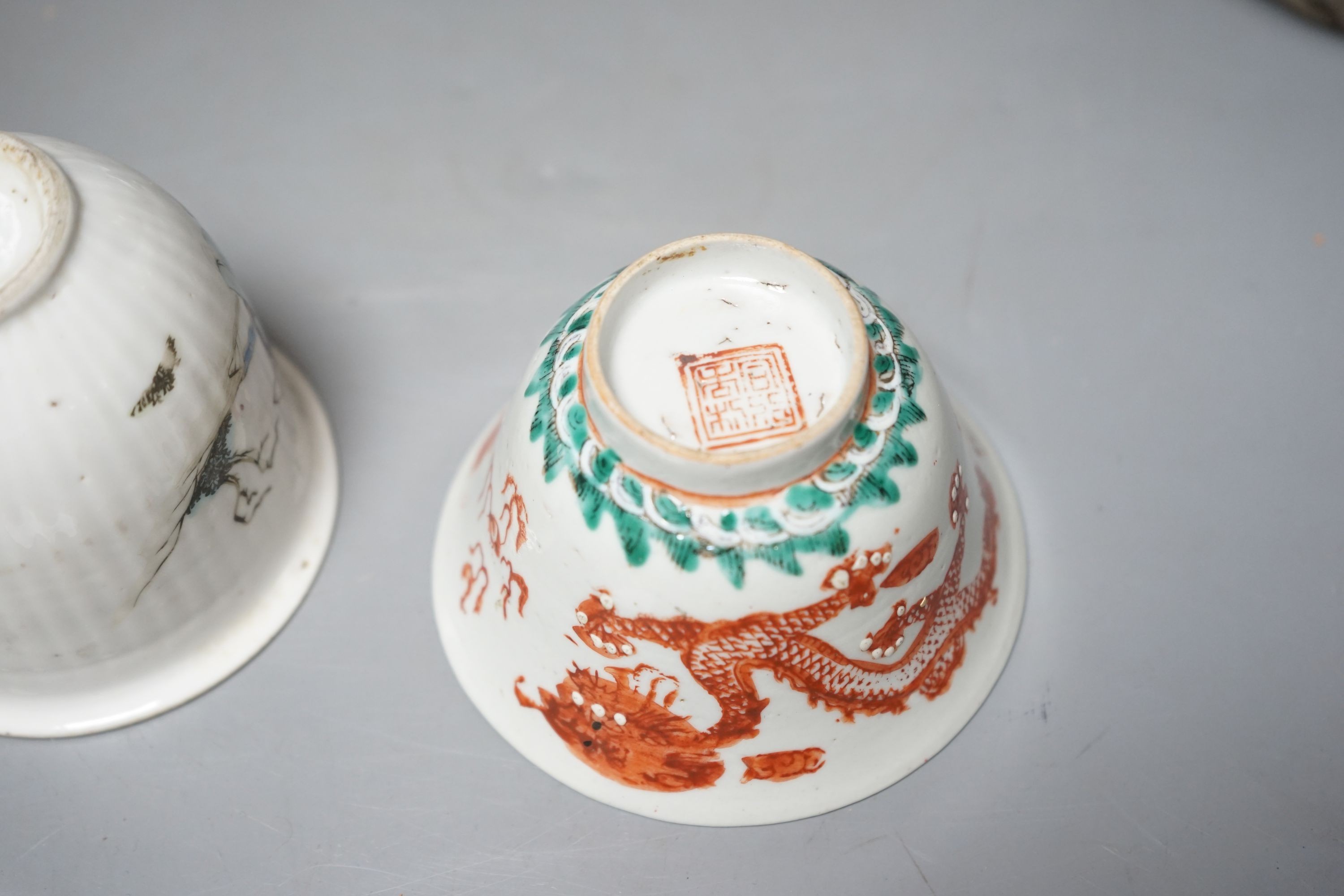 A Chinese blue and white vase, Xuande mark, c.1900, two late 19th Century Chinese cups and four Chinese provincial earthenware jars 19cm